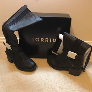 Torrid tall heeled boots.